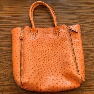 Studio 36 medium to large purse/tote bag. Really nice quality. Orange/4 zip outs